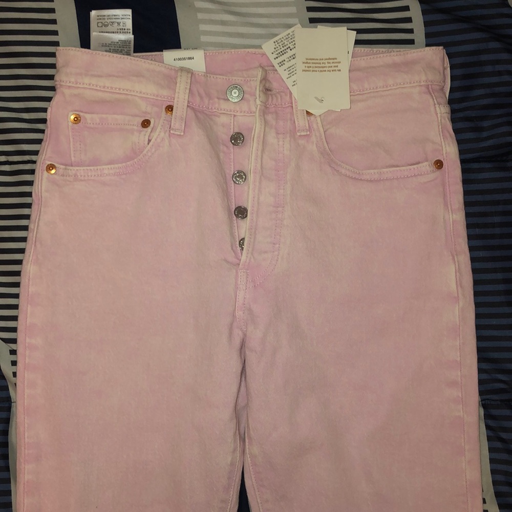 Pink wash Levi’s skinny jeans 501